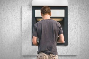 Man in front of ATM